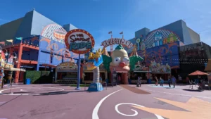 Façade principale de Krustyland, où se tient l’attraction “The Simsons Ride”. Pour entrer, il faut passer par la bouche de Krusty le clown.